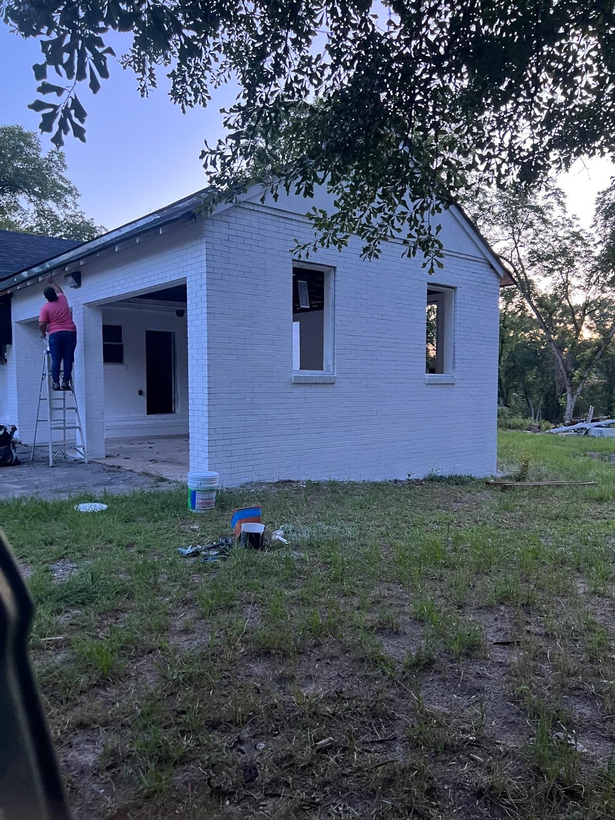 Completed brick home exterior painting project